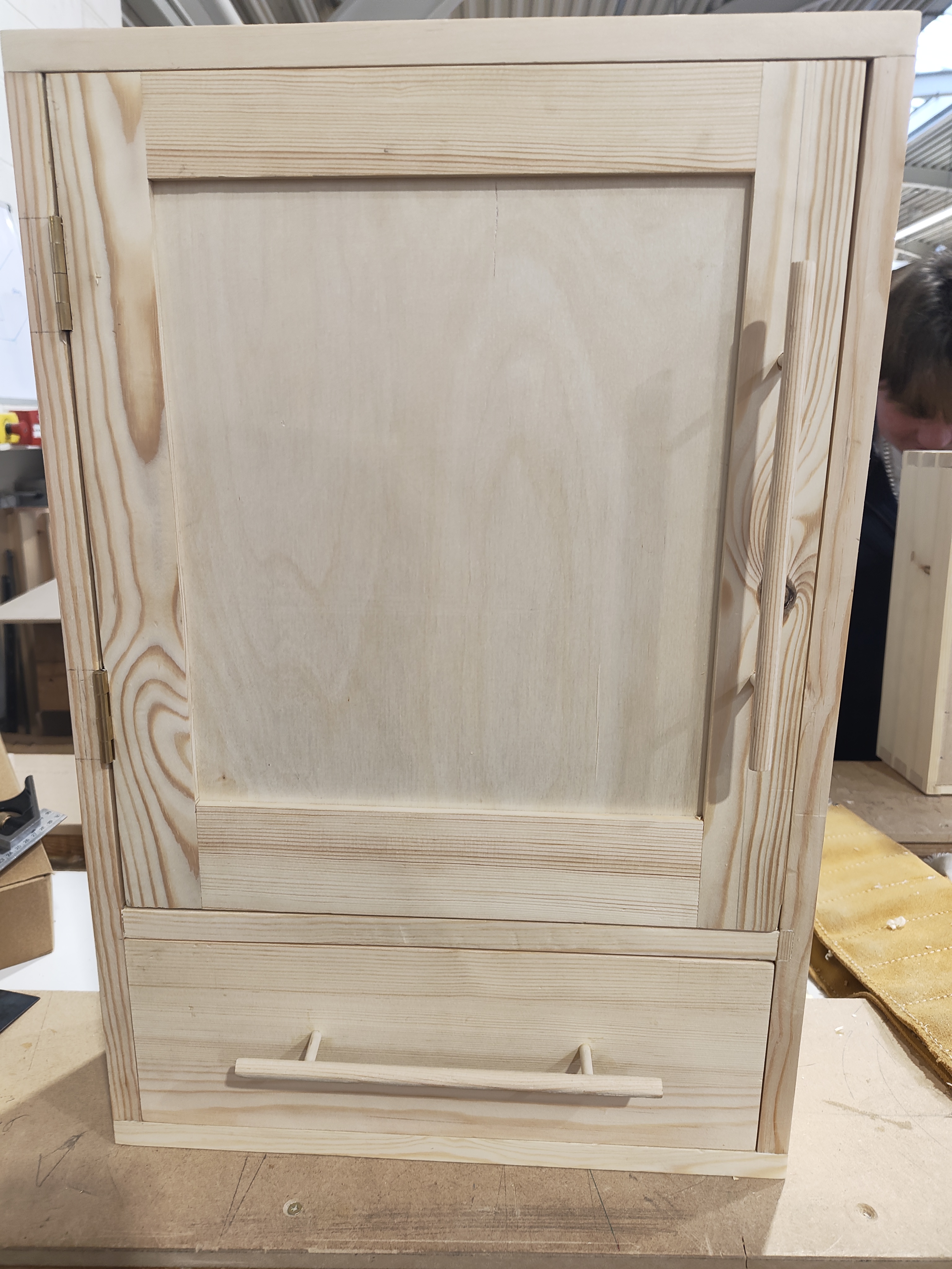 Pine cabinet — side view showing hinge detail